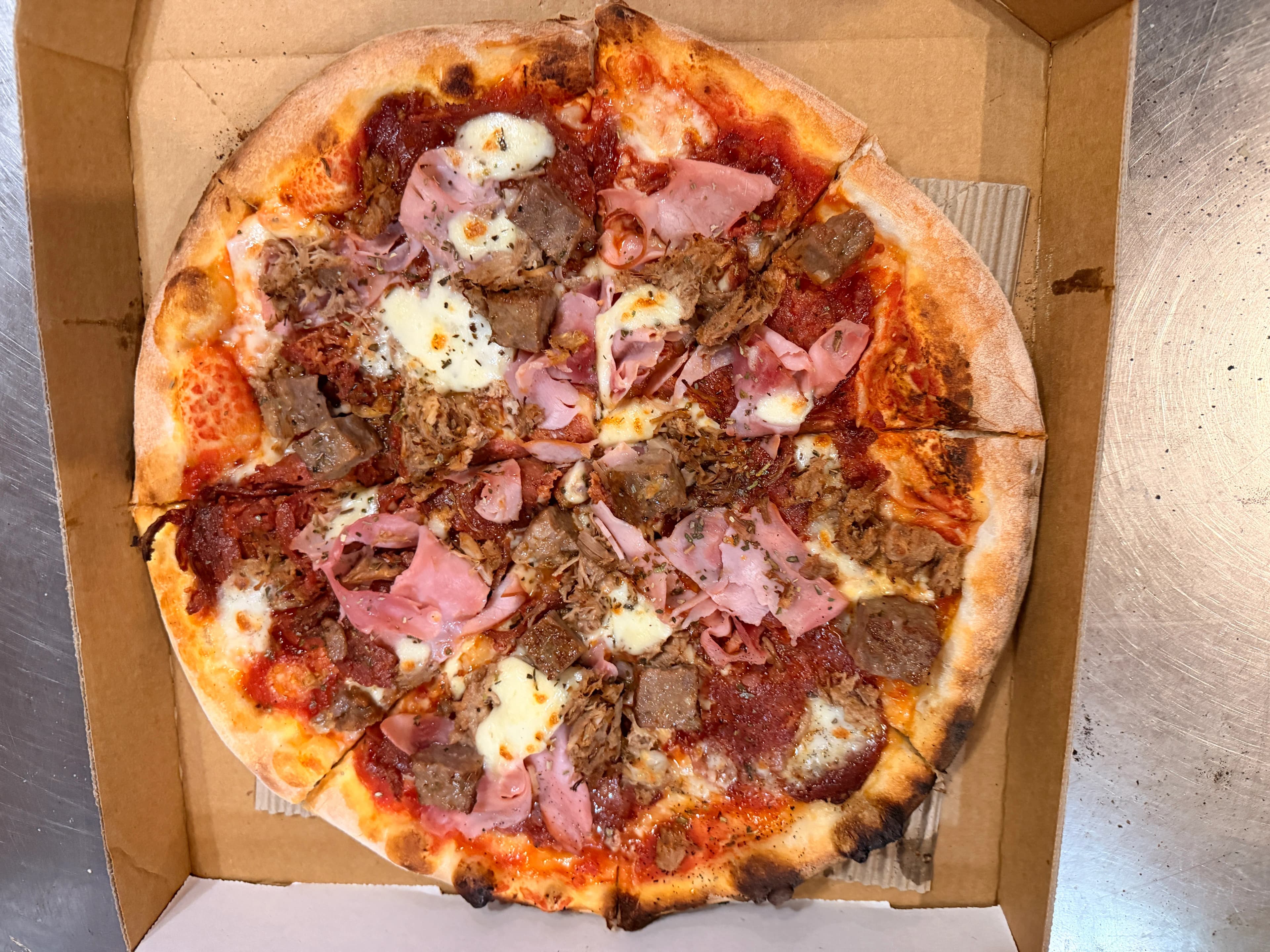 Wood-fired pizza with fresh toppings